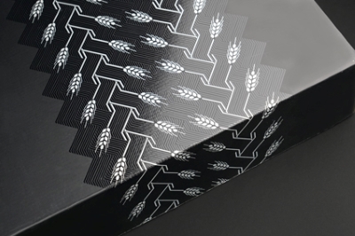 Shiny UV coating on offset print adds depth and contrast.
